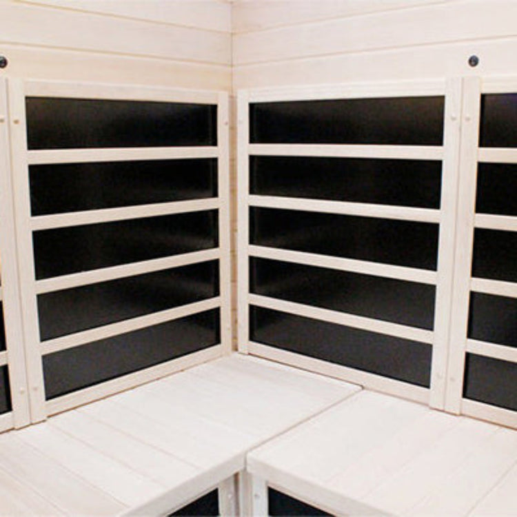Infrared sauna with black panels and wooden interior