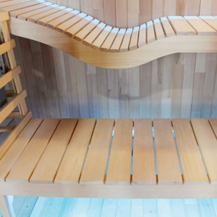 wooden benches in outdoor steam sauna